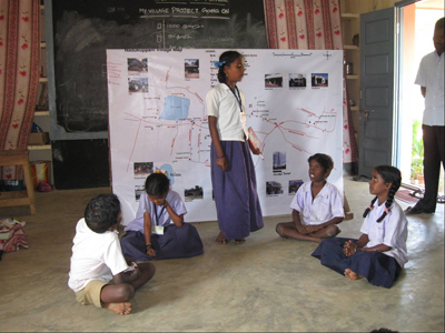 [picture of Children learning about maps at school]